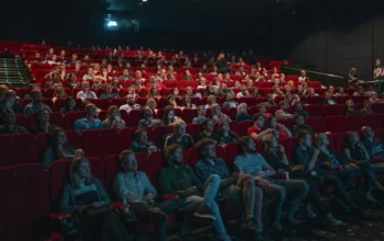 Cinema seats and movie theatre interior representing box office success