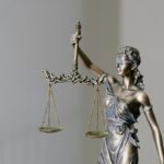 Photo: Unsplash (stock) — representative justice imagery, not this case