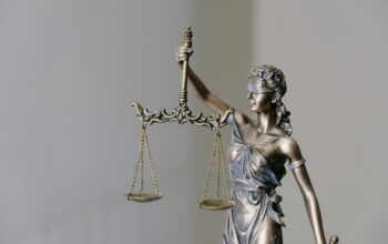 Photo: Unsplash (stock) — representative justice imagery, not this case