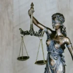 Court gavel and law books representing a judicial verdict