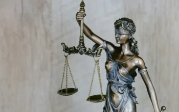 Court gavel and law books representing a judicial verdict