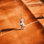 Tennis court and racket scene representing professional tennis competition